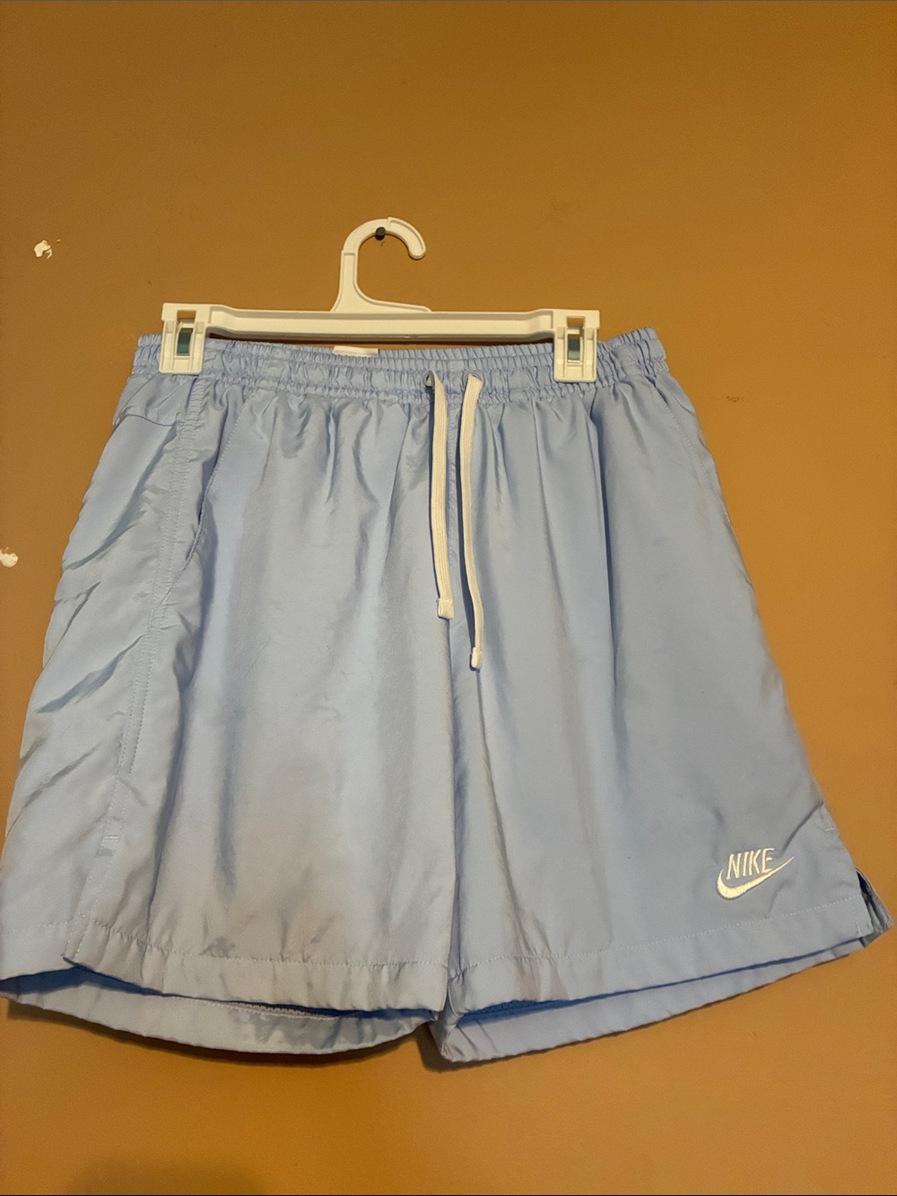 Nike Baby Blue Athletic Shorts with White Drawstring